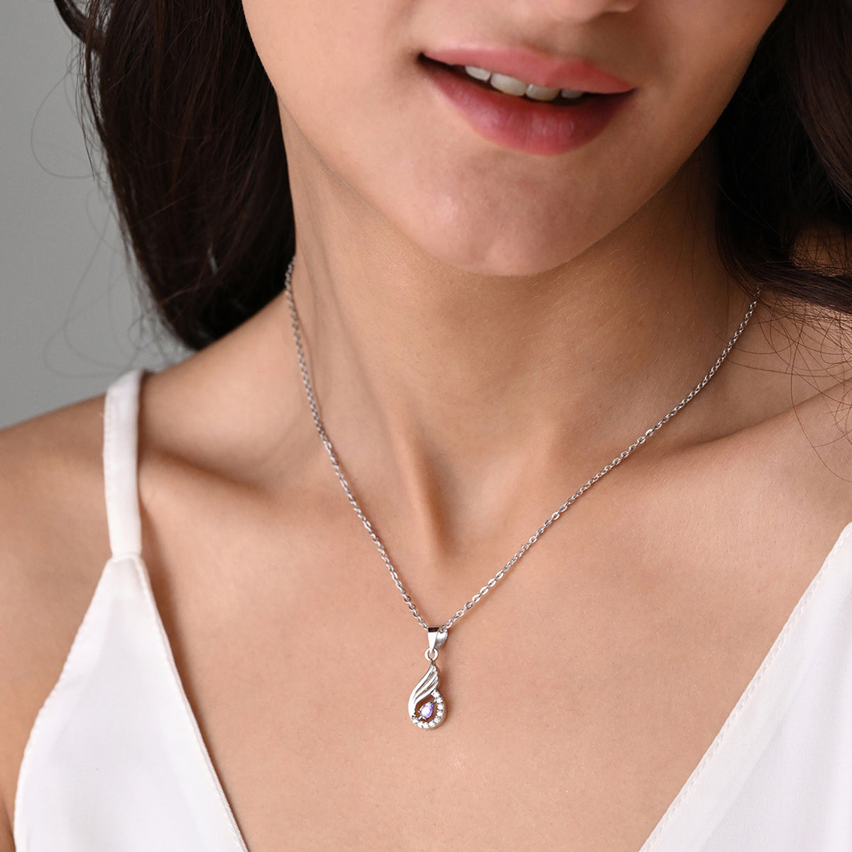 Niharika 925 Silver Purple Stone Wing Pendant with Chain